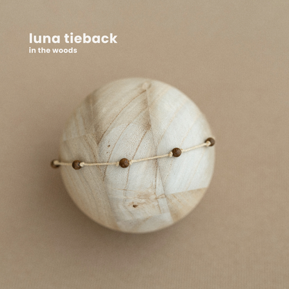 LUNA TIEBACK : in the woods