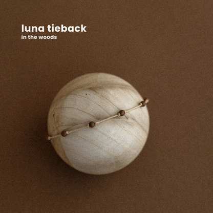 LUNA TIEBACK : in the woods